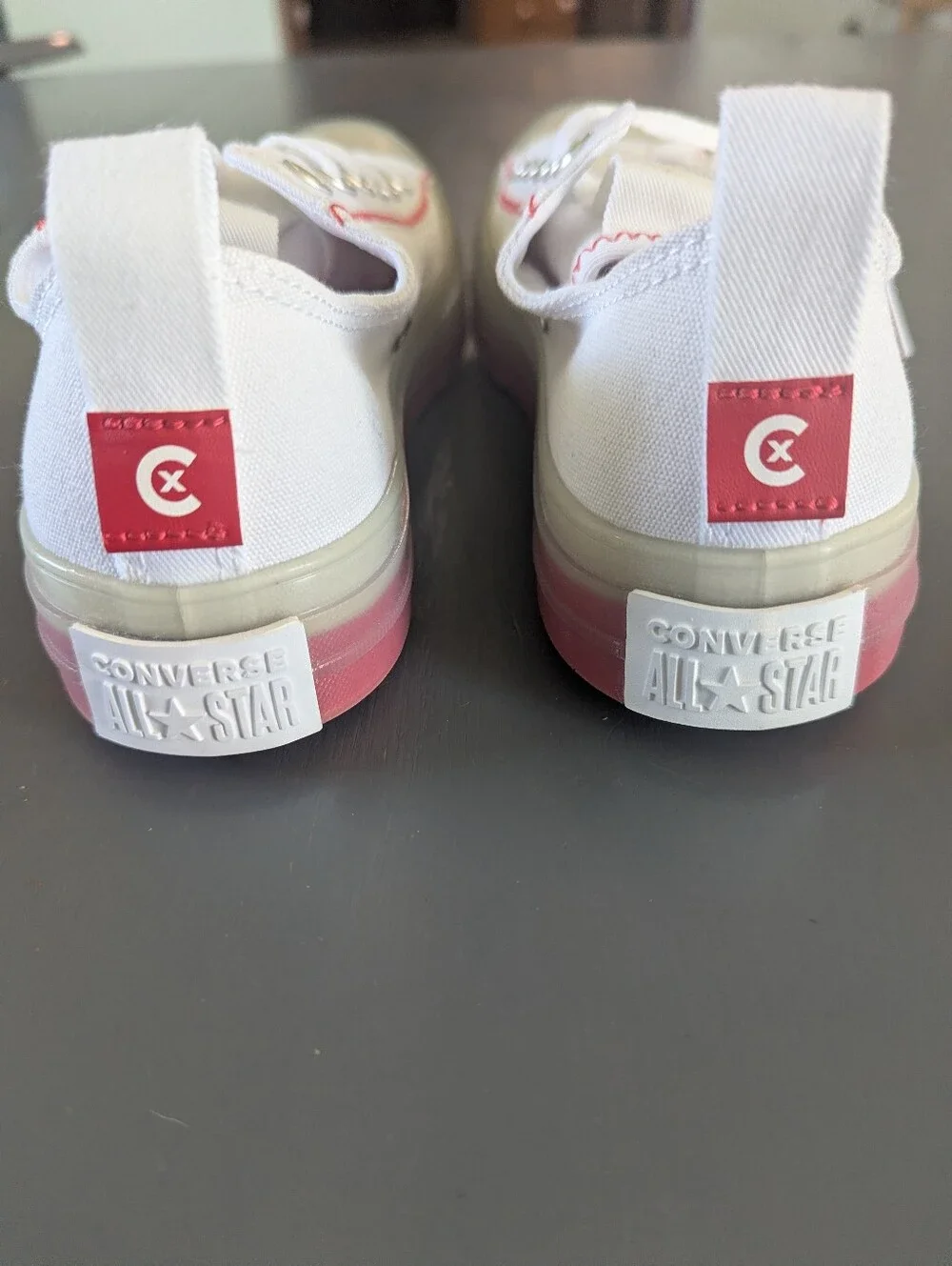 Converse Women's White Canvas Sneakers with Pink/Coral Accent Sole And Stitching
